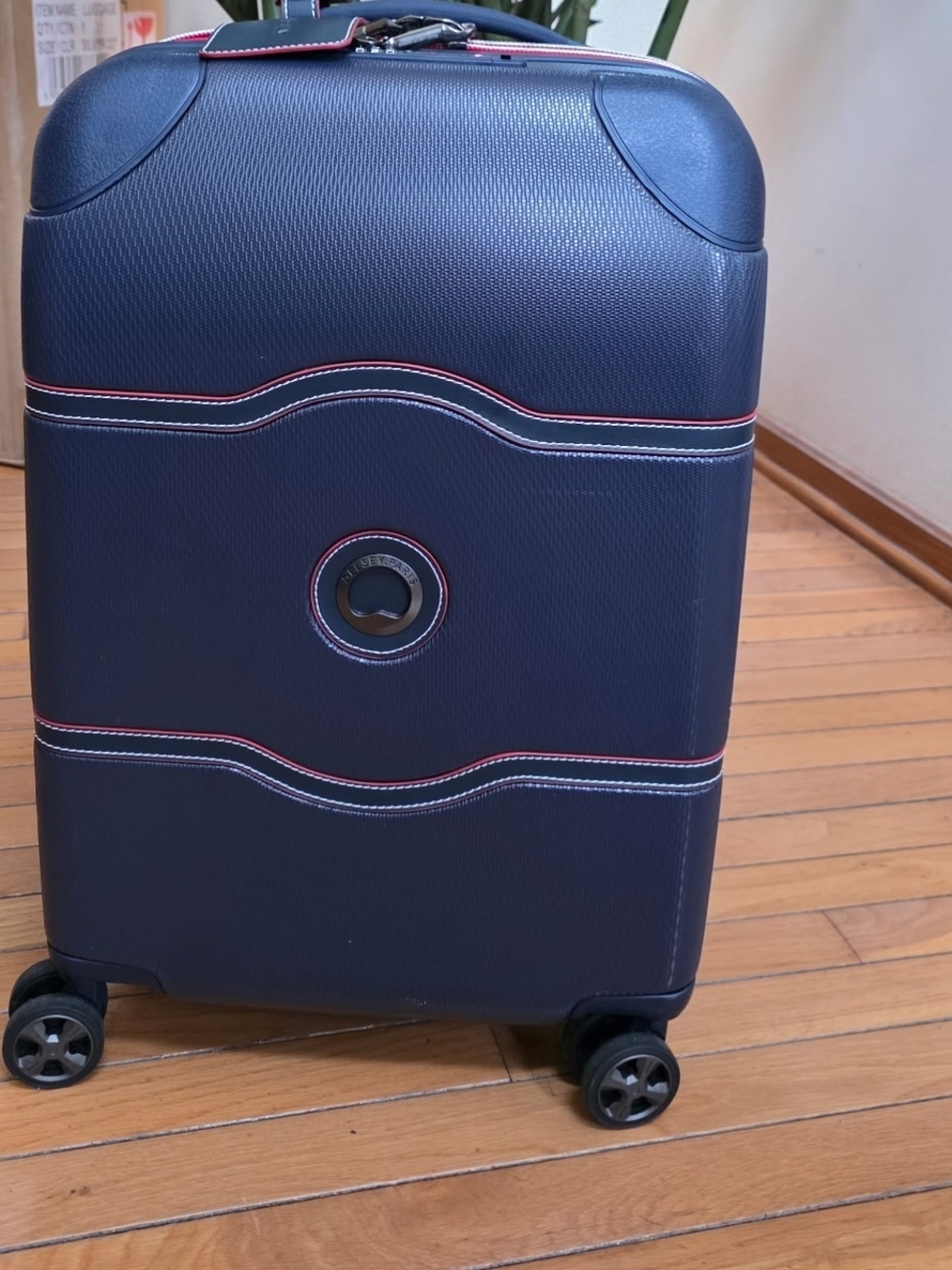Navy Spinner Carry-On with Red & White Trim